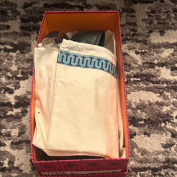 Tory Burch Black Flats with Silver Emblem - Picture 9 of 10